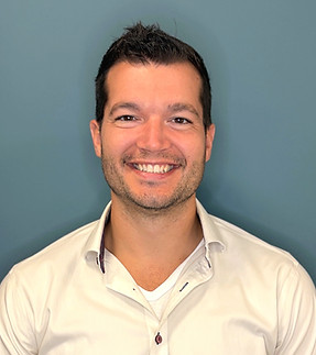 Chiropractor Dr. Christian Carroll helping patients with pain relief, mobility and full-body wellness in Hopkinton, MA.