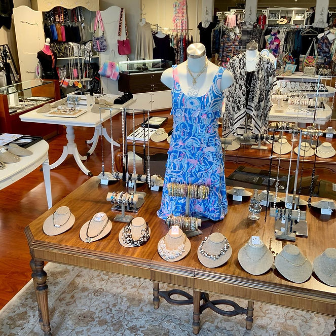Women's clothing and jewelry boutique located in Orange, CT. Dress, fashion, clothing, sterling silver, earrings, necklace, bracelet, messenger bag, purse, tote, style.