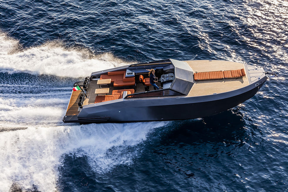 Mazu 38 underway with open cockpit seating and helm visible