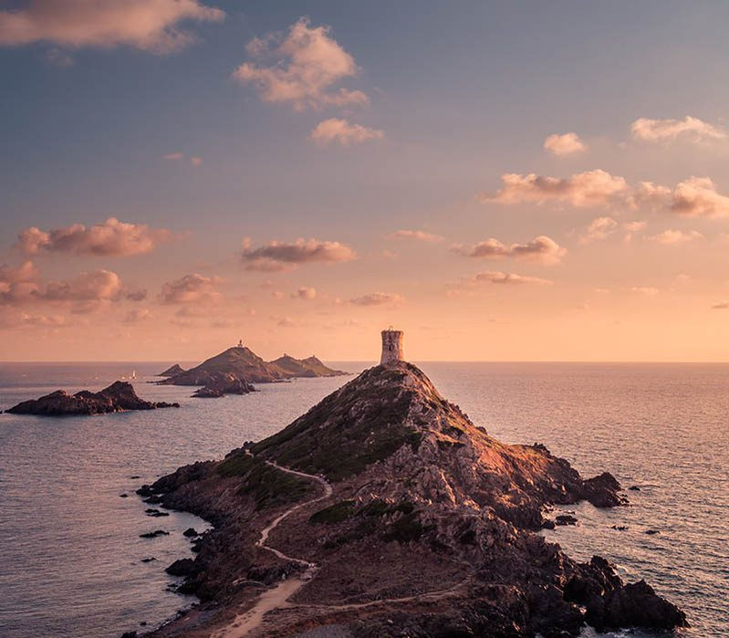 Sunset view of the Sanguinaires Islands in Corsica with Genoese Tower