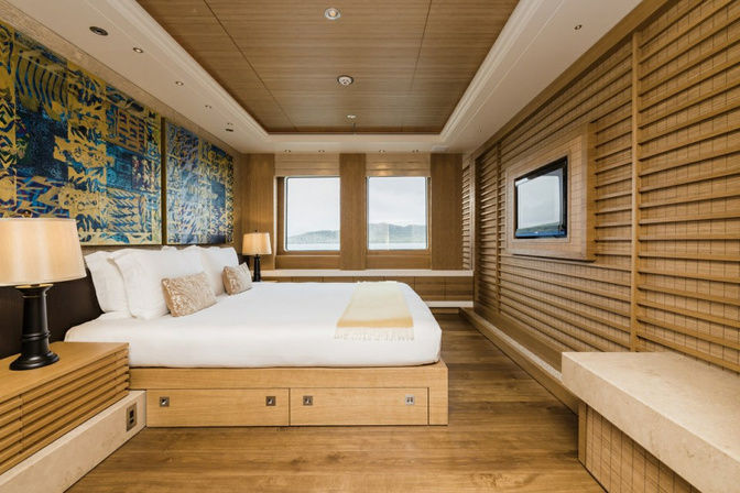 Twin guest stateroom with luxury bedding onboard yacht charter