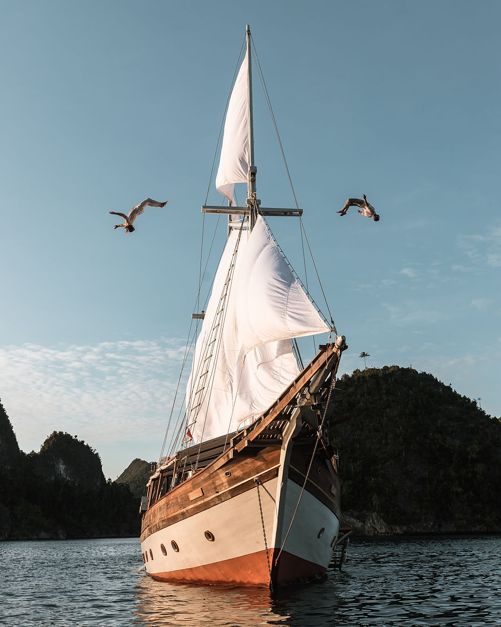 Anne Bonny luxury phinisi yacht sailing in Komodo National Park during a private liveaboard charter in Indonesia