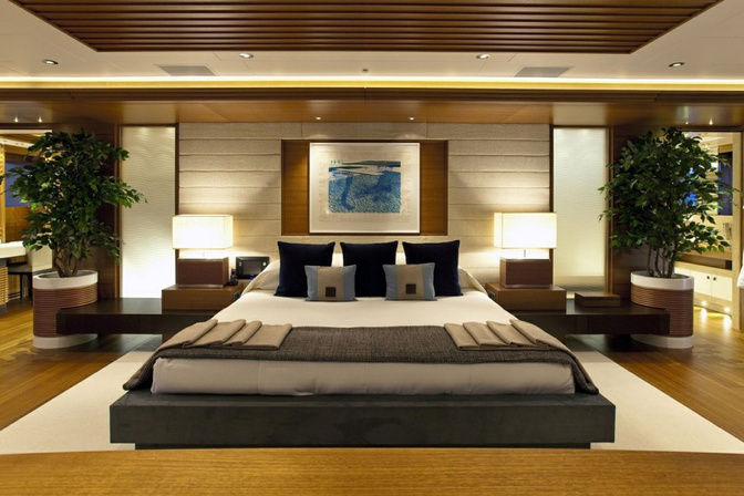 Master suite with king-size bed and warm interior design