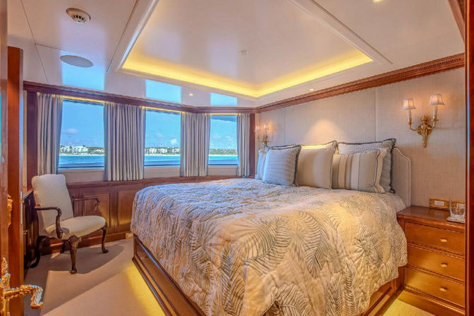 Spacious master suite with king bed and elegant décor