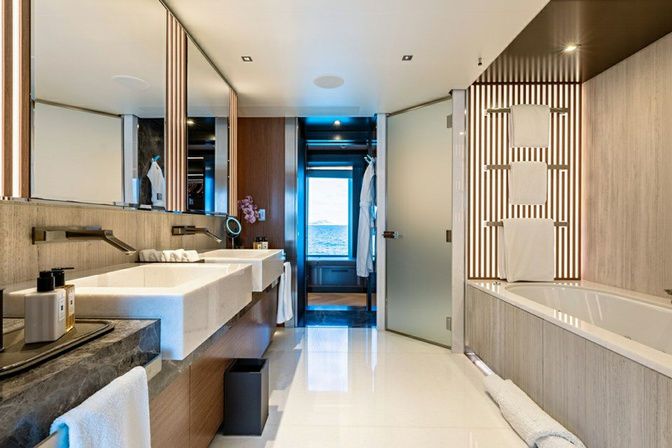 VIP bedroom onboard superyacht with luxury furnishings