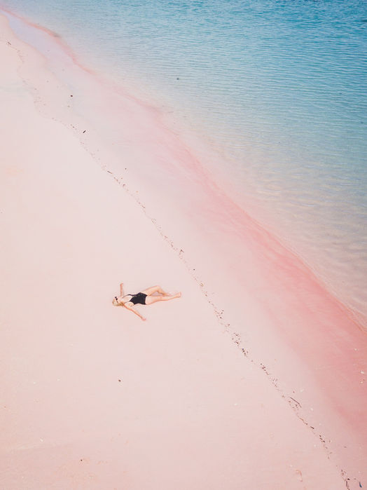 Drone shot of Pink Beach in Komodo National Park with soft rose-tinted sand