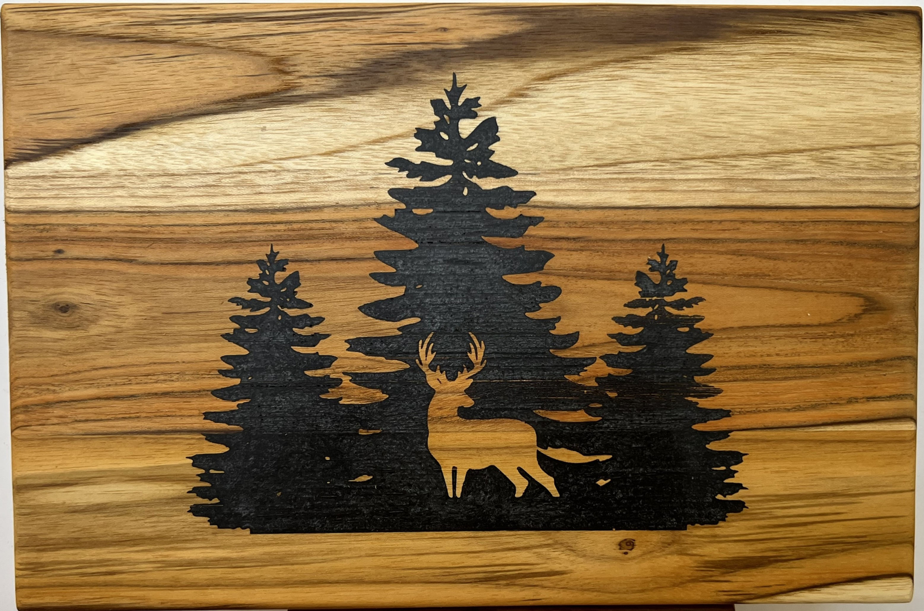 Buck Silhouette in the Trees