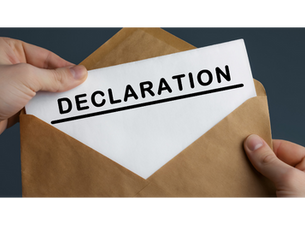 Hands pulling a paper labeled DECLARATION from a brown envelope against a dark background.