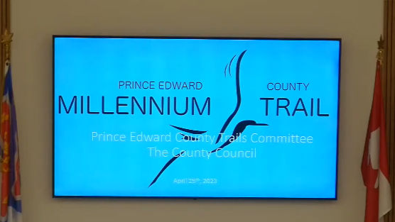 Blue screen displaying "Prince Edward County Millennium Trail." Includes text: "Prince Edward County Trails Committee The County Council April 25th, 2023."