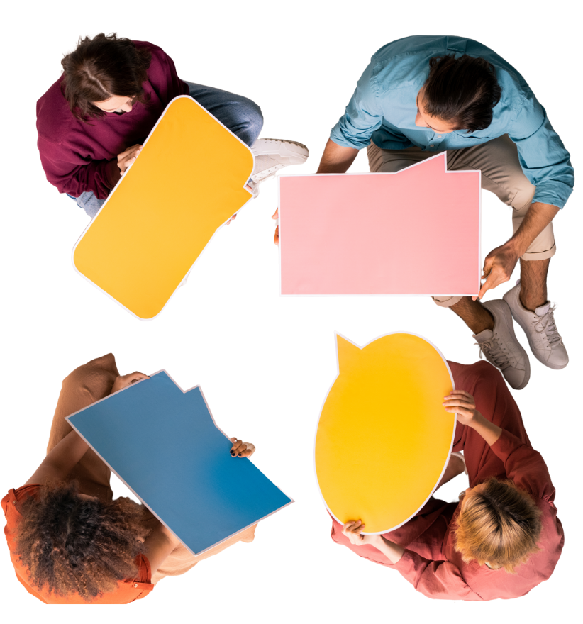 Four people sit holding colorful speech bubble signs—yellow, pink, blue, orange—on a white background, conveying communication.