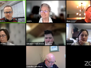 Video call with seven participants in a grid layout. Some are focused, others are smiling. The background varies, and the Zoom logo is present.