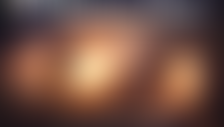 Silhouette of a man carrying a cross at sunrise with light shining from an empty tomb, representing a Good Friday Christian reflection on Jesus Christ