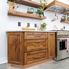 Kitchen with dark wood lower cabinets and white upper cabinets