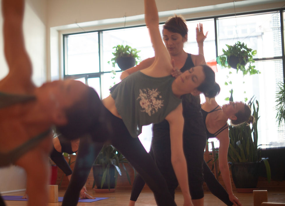 Jeanne Mudie teaching a group of students