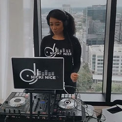 DJ Nicki Nice djing at an event