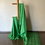 Thumbnail: green colored cotton soft silk saree draped on a saree stand