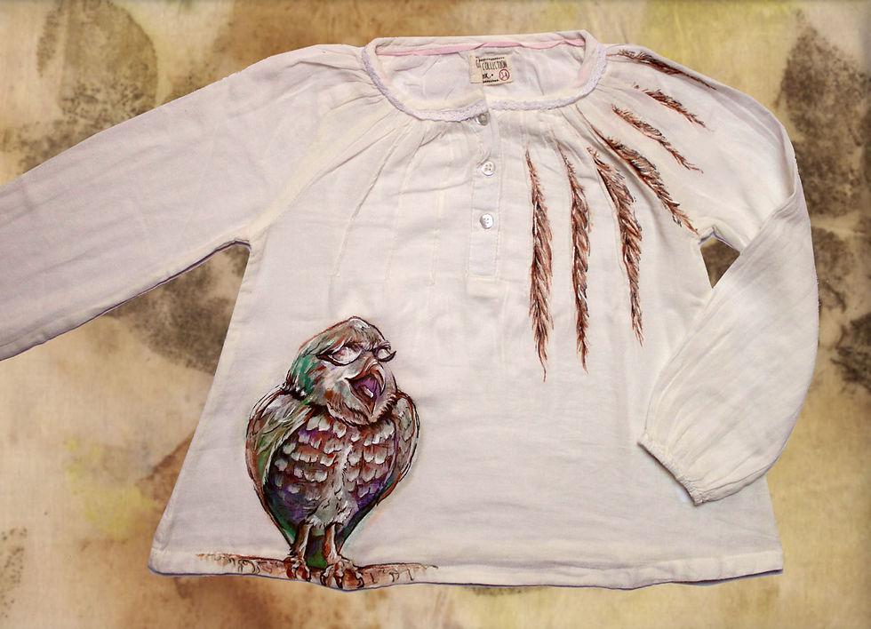 Blusa Buho y plumas