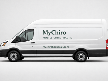 White van with "MyChiro Mobile Chiropractic" and website text on the side, parked against a plain background.