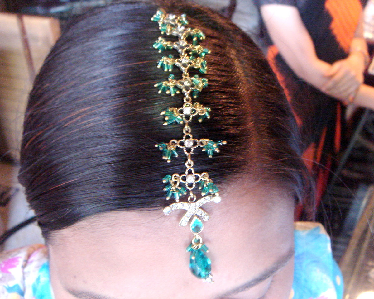 Matching colour designer Tikas or Head Ornament