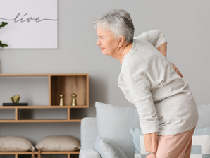 How does exercise physiology help manage back pain?