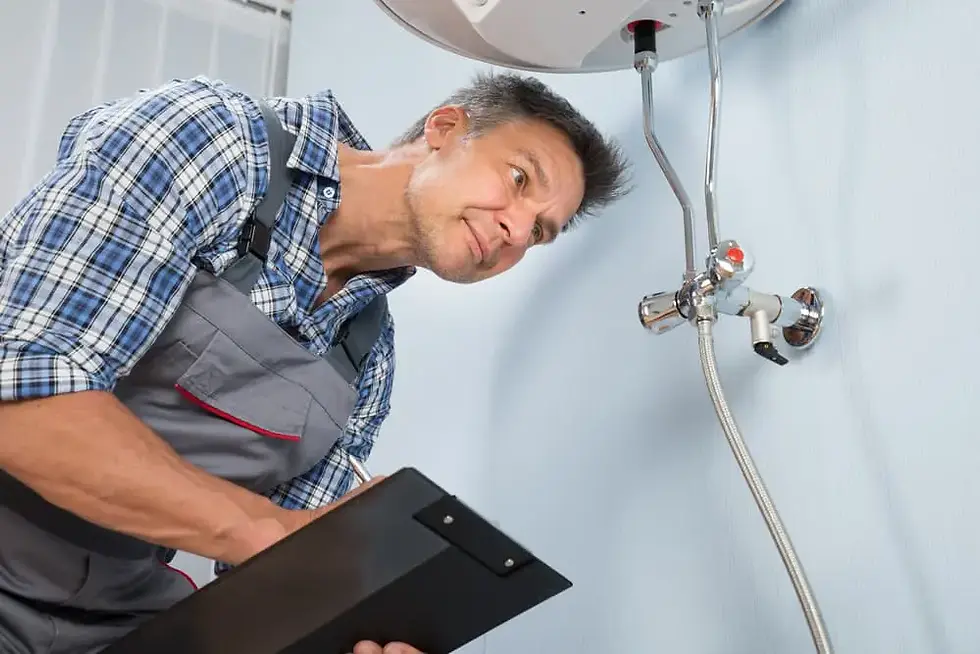 Home inspector and contractor reviewing repair checklist after a house inspection.