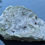 Thumbnail: Calcite and Chalcopyrite crystals on rock matrix.