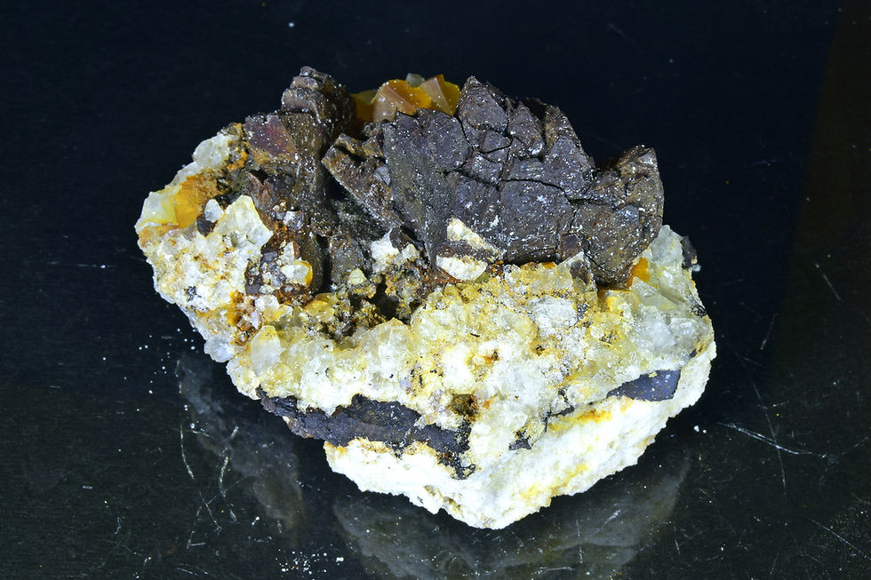 Goethite pseudomorphs of Marcasite on Fluorite