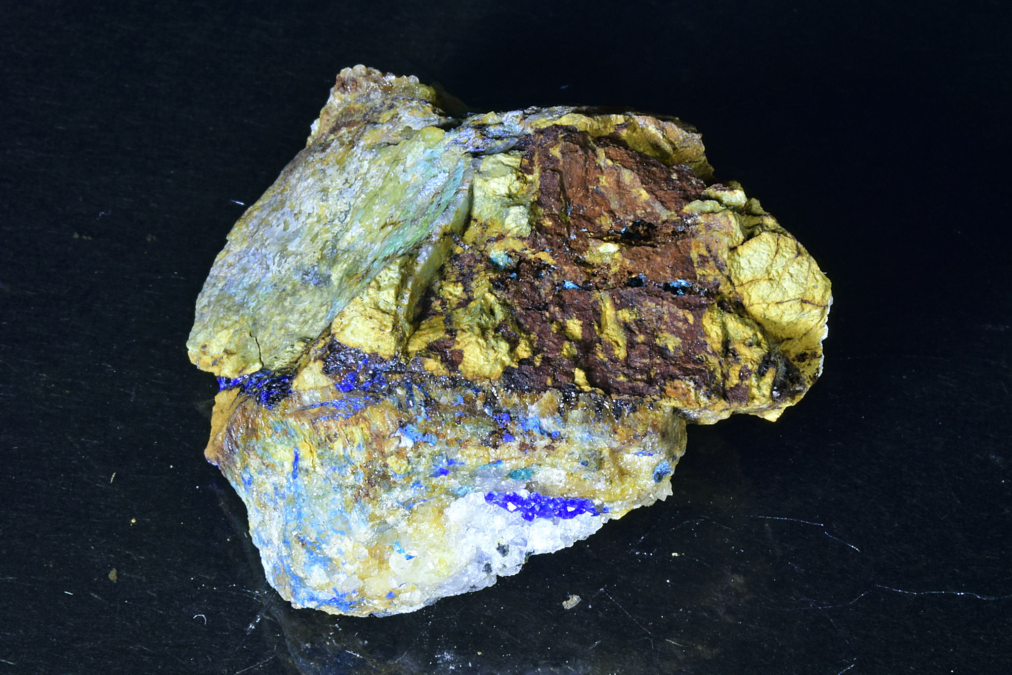 Azure blue Linarite crystals with Caledonite in cavity