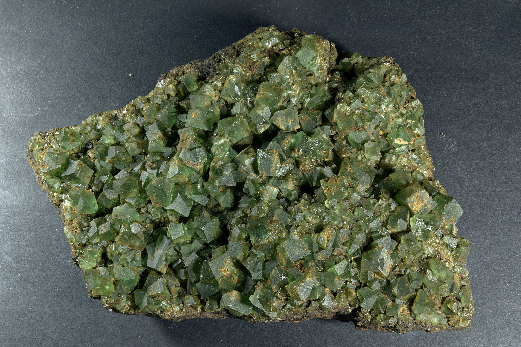 Green Fluorite crystals on limestone