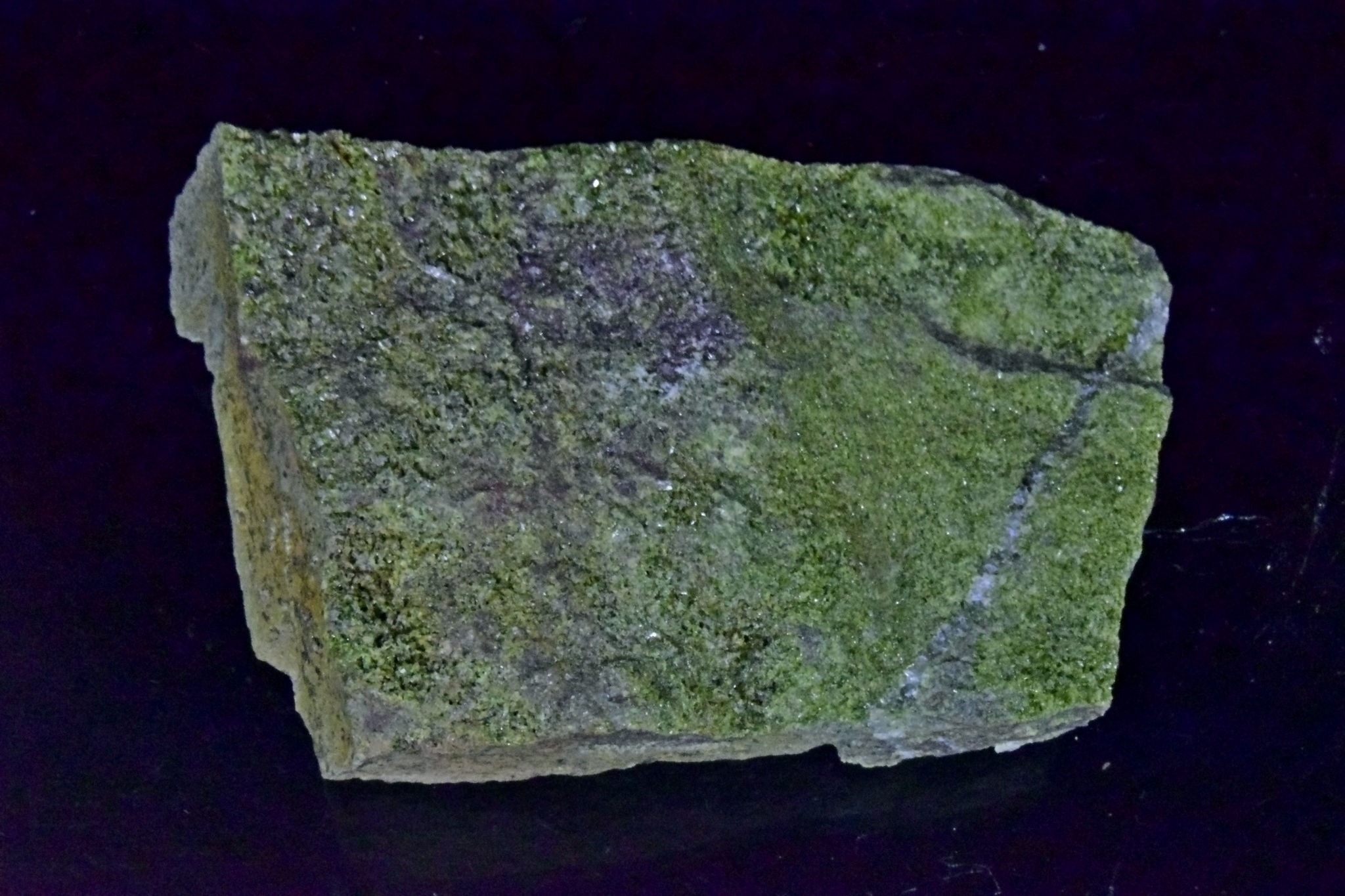 Epidote crystals on rock