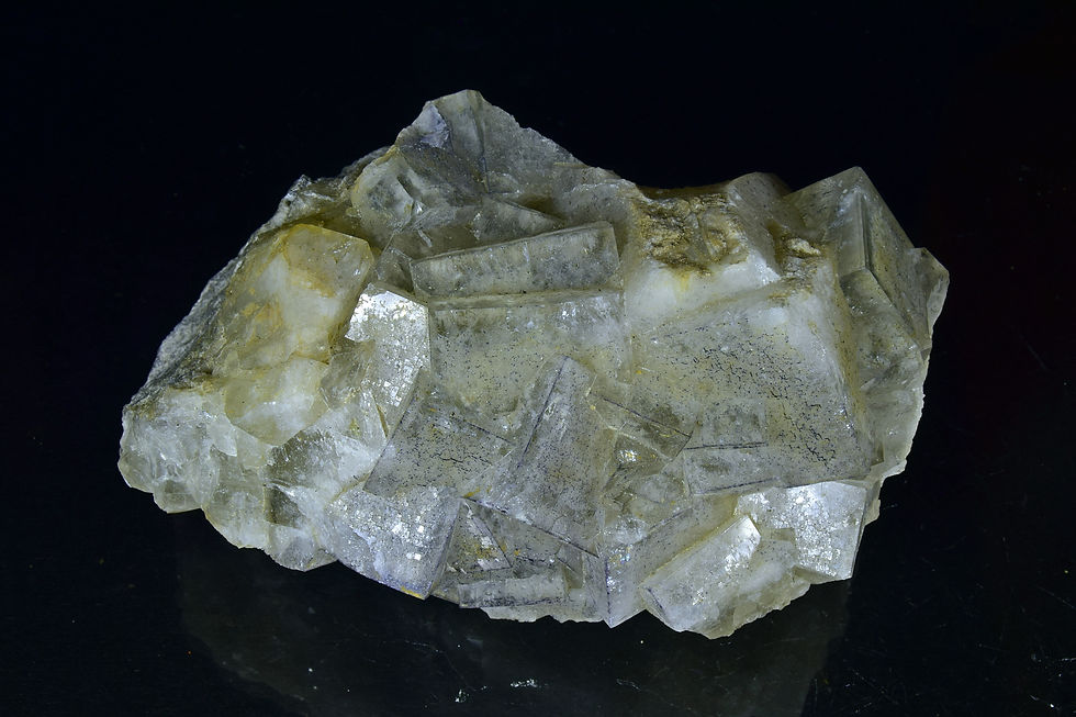 Thumbnail: Clear cubic Fluorite crystals on limestone