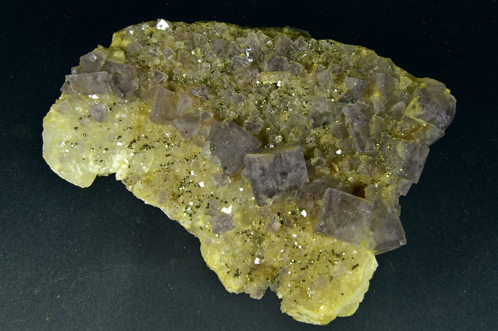 Thumbnail: Purple cubic Fluorite crystals on Quartz