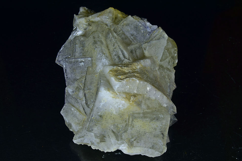 Clear cubic Fluorite crystals on limestone
