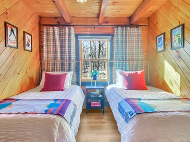 Skypine Lodge twin bedroom cozy design blankets