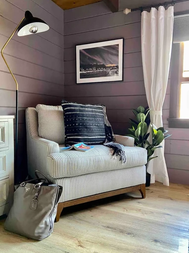 Skypine Lodge primary bedroom seating area cozy reading nook