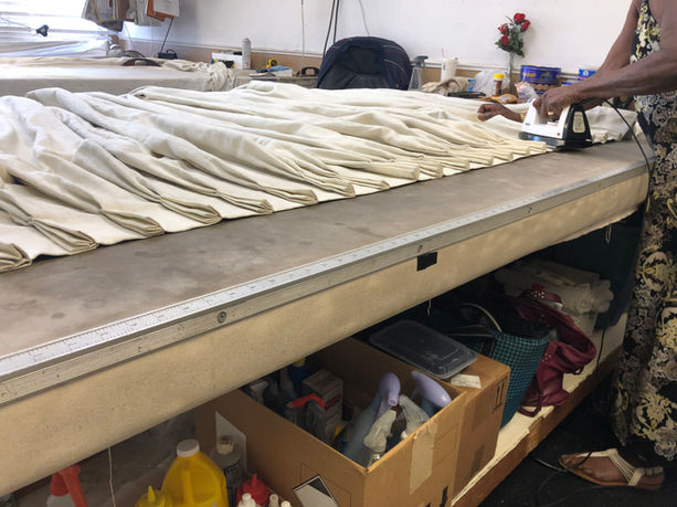 Drapery Take Down & Re-Hanging Services