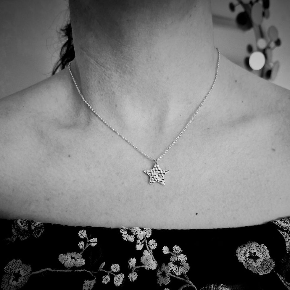 Thumbnail: Memorial ashes in silver star pendant by KL jewellery designs