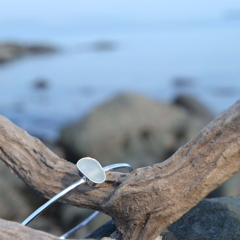 Thumbnail: Handmade silver grey sea glass stacker bangle, made using recycled silver and Irish sea glass