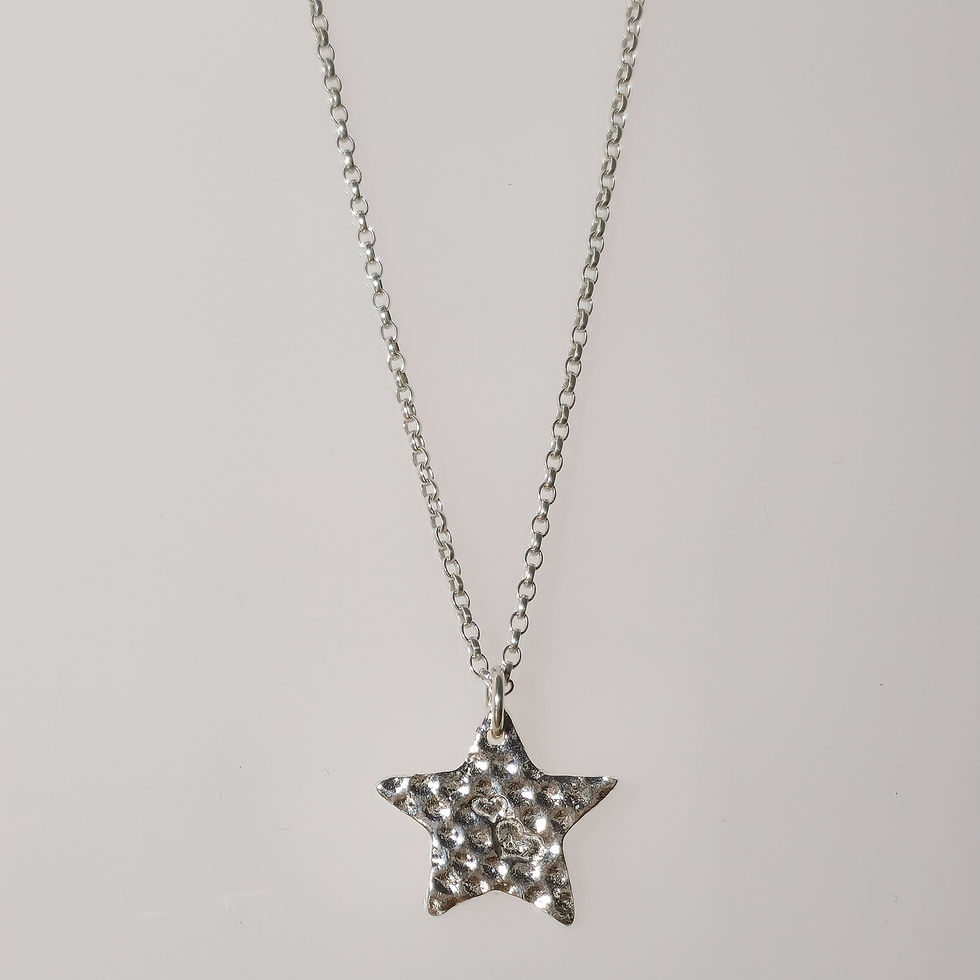 Thumbnail: Memorial ashes in silver star pendant by KL jewellery designs