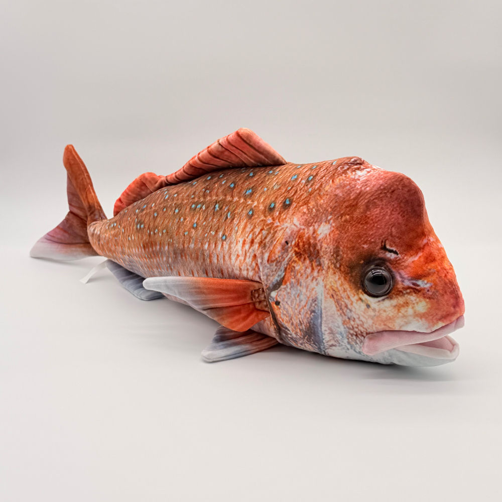 Front view Huggable Toys Sonny snapper with orange reddish fabric, blue markings, detailed fins and big eyes