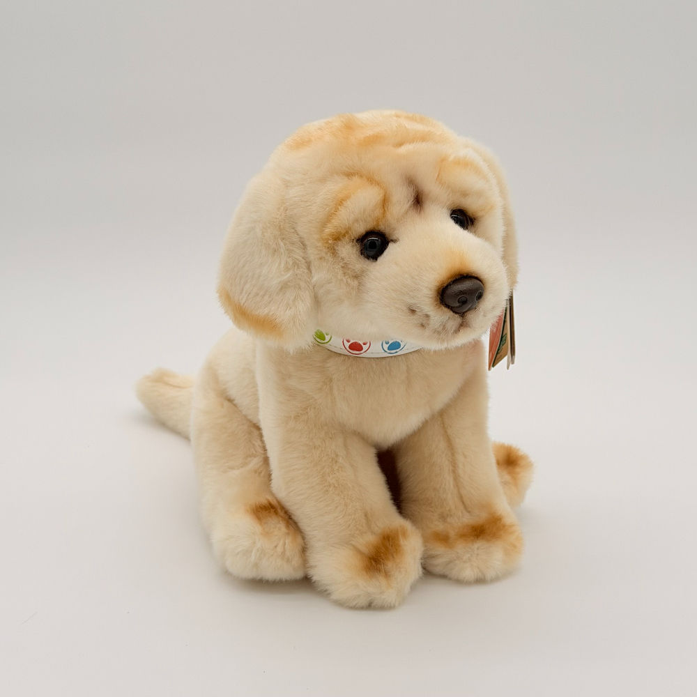 Front view Living Nature 24cm labrador plush toy with soft light coloured fur, black nose and eyes and cute frown
