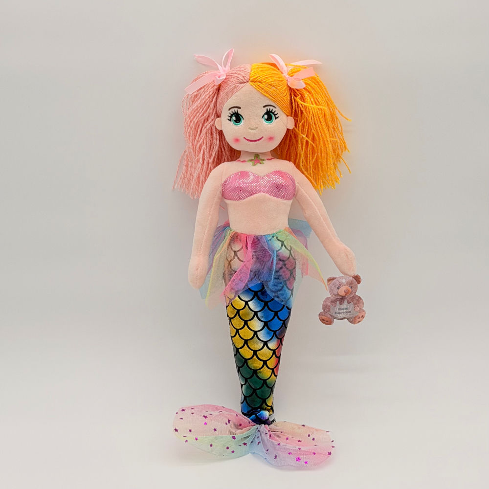 Front view Huggable Toys Agatha Mermaid plush doll with yellow & pink hair, multi coloured shimmery tail, pink tuille skirt