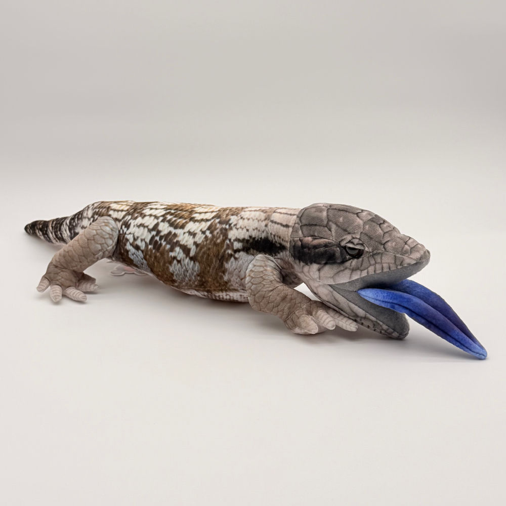 Front view Huggable Toys 60cm Blue Tongue Lizard plush toy with soft brown-and-grey textured fabric and a bright blue tongue
