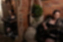 Delaware female boudoir photographer queer musician playing guitar