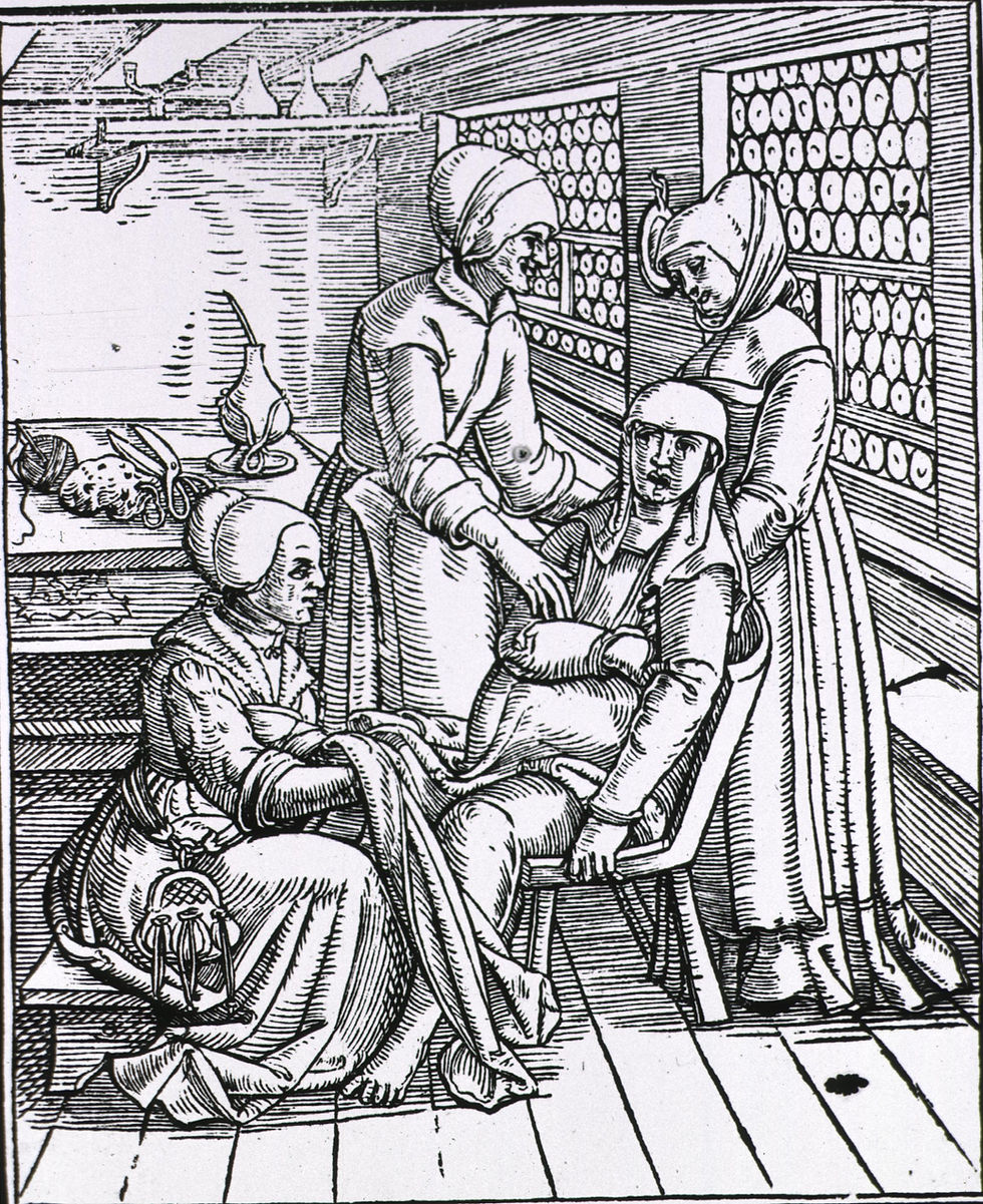Black-and-white woodcut of three midwives in head coverings tending a birthing mother in a room with shelves of round jars.