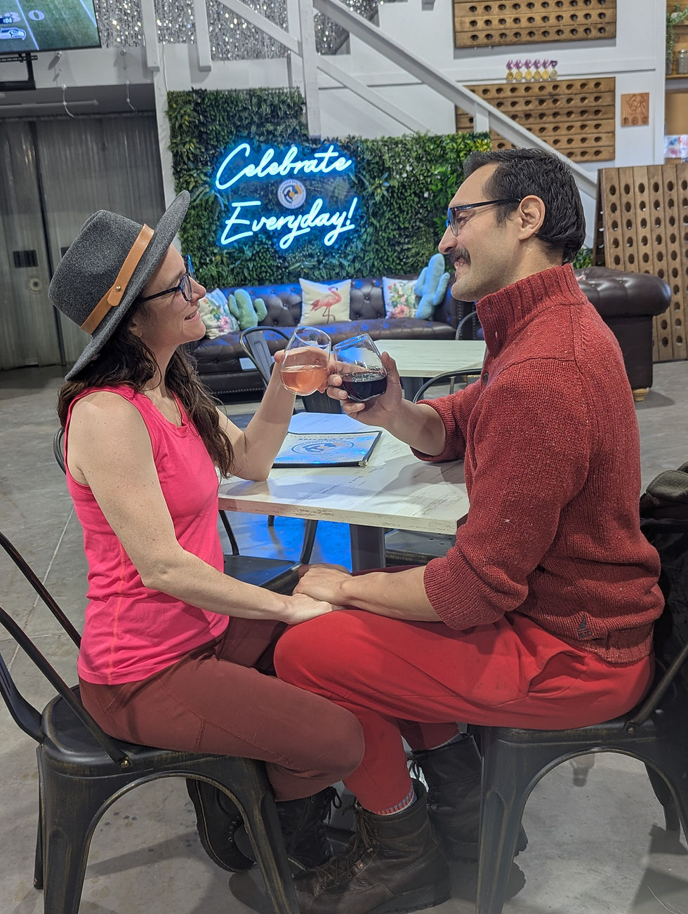Couple drinking wine at a Palisade, Colorado winery