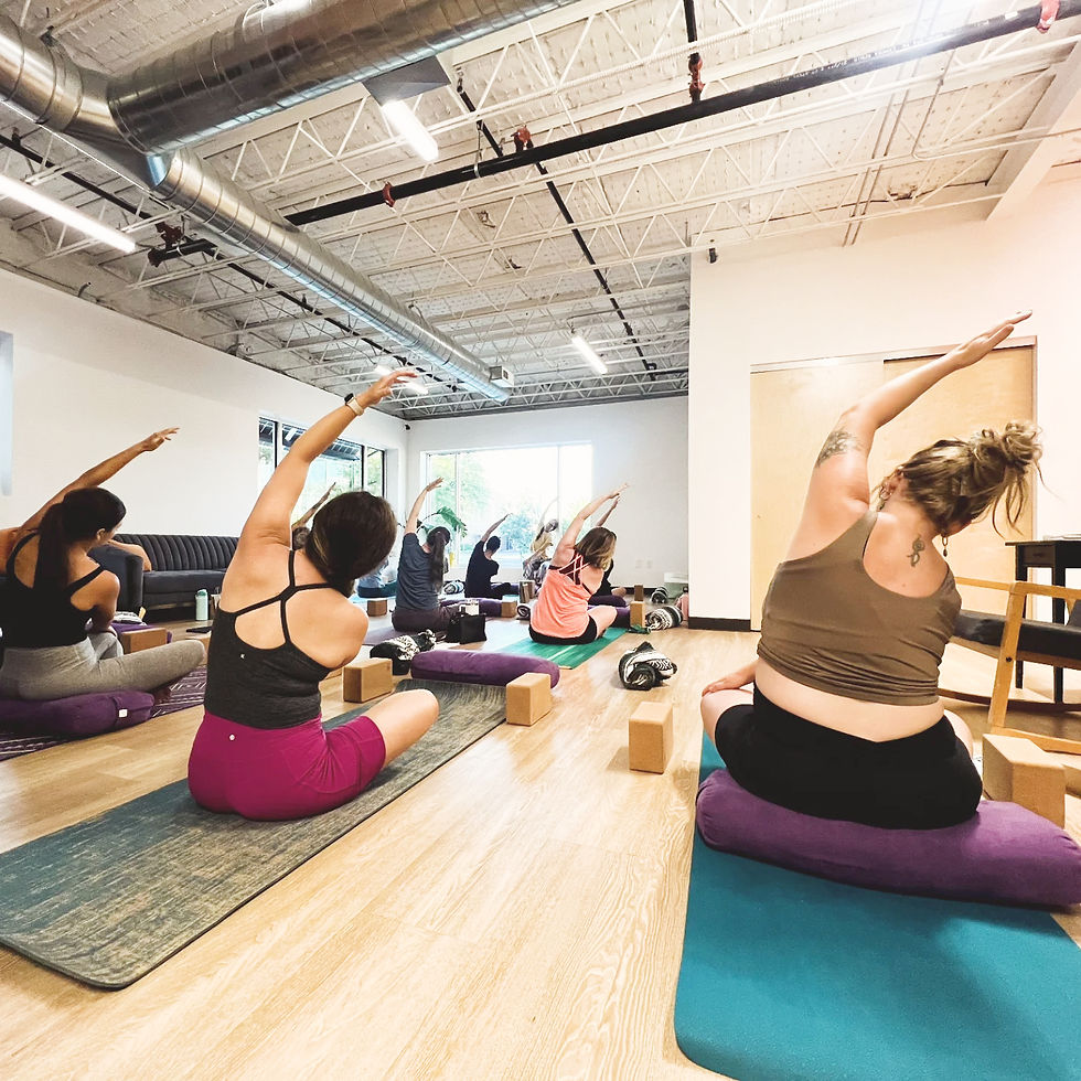 Mamas enjoy a calming prenatal yoga class