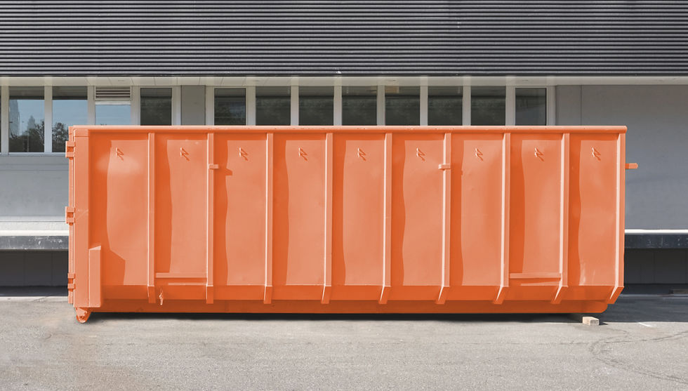 Eye-level view of a hotel waste management station with clearly labeled bins