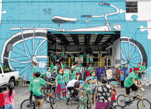 ‘Bike Man,’ Volunteers Make Smiles With 2-Wheeled Gifts