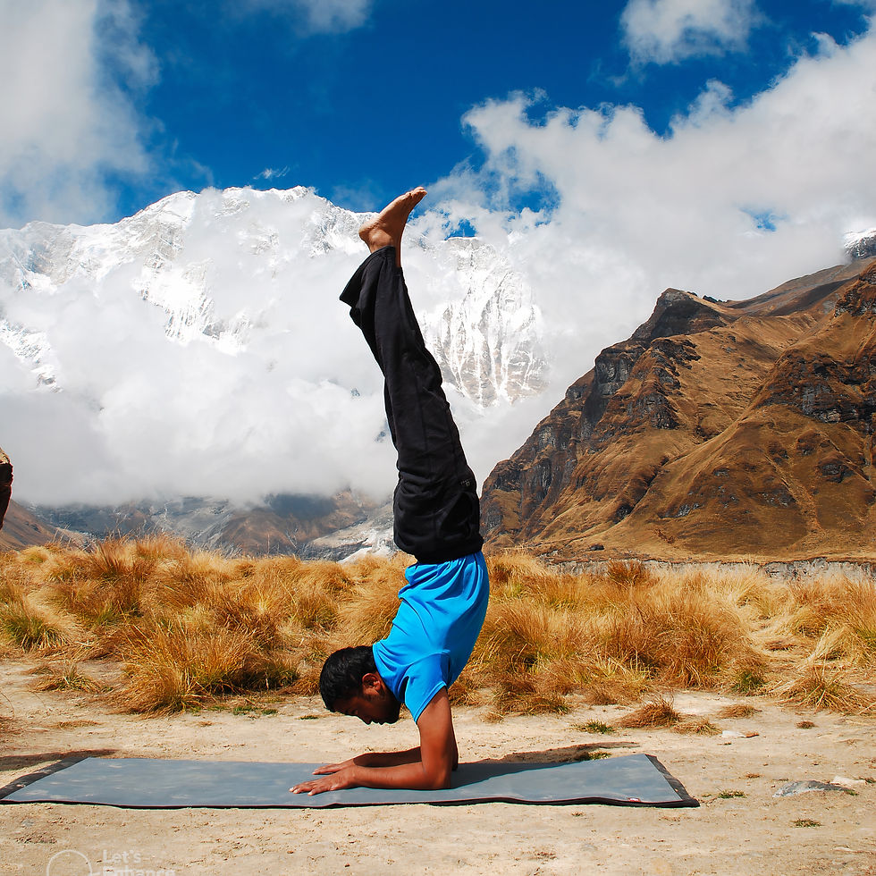 Vinay Siddaiah practicing Yoga at Annapurna Base Camp. Yoga during cold weather